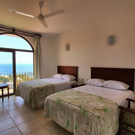פוארטו אסקונדידו Hotel Caracol Plaza מראה חיצוני תמונה