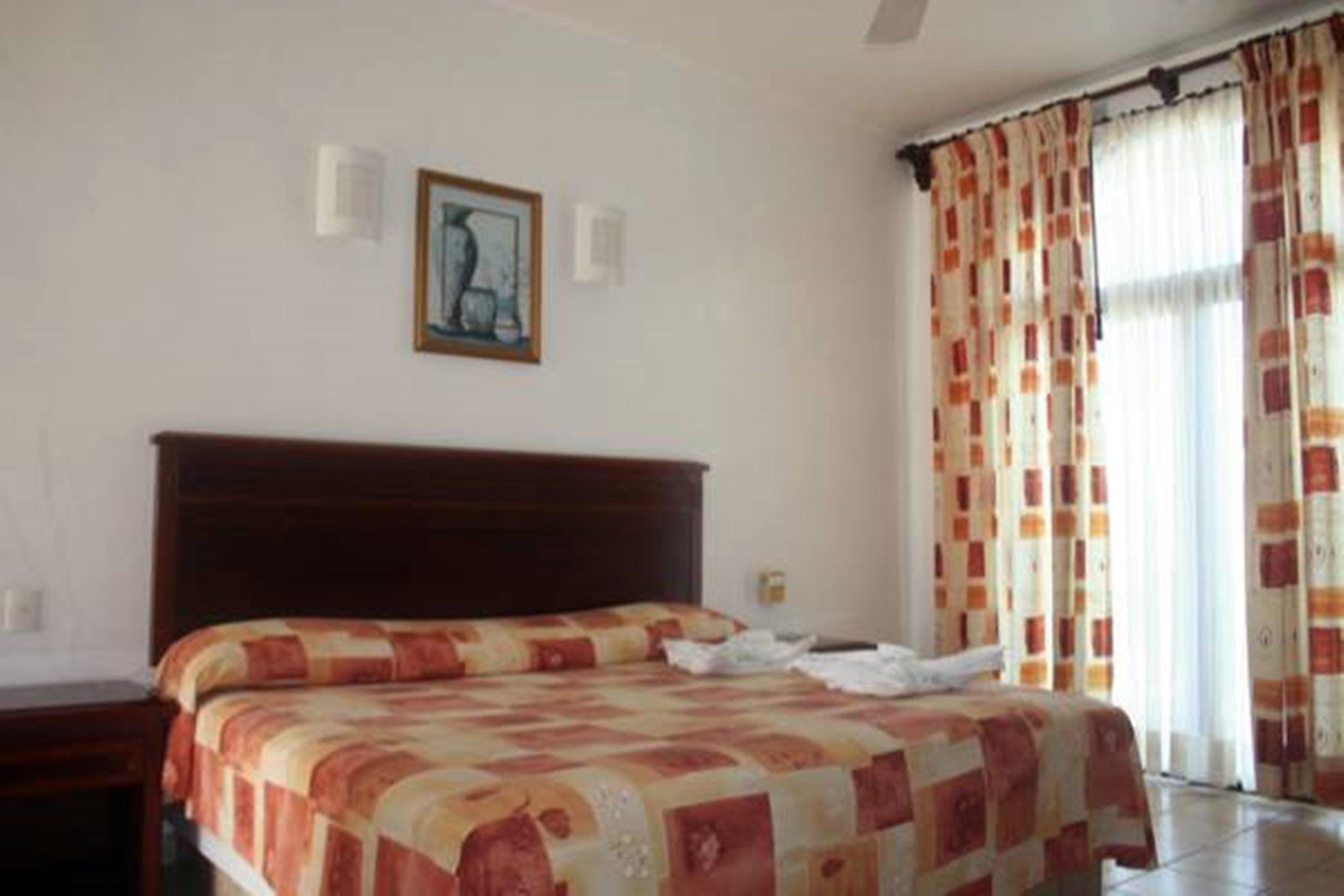 פוארטו אסקונדידו Hotel Caracol Plaza מראה חיצוני תמונה