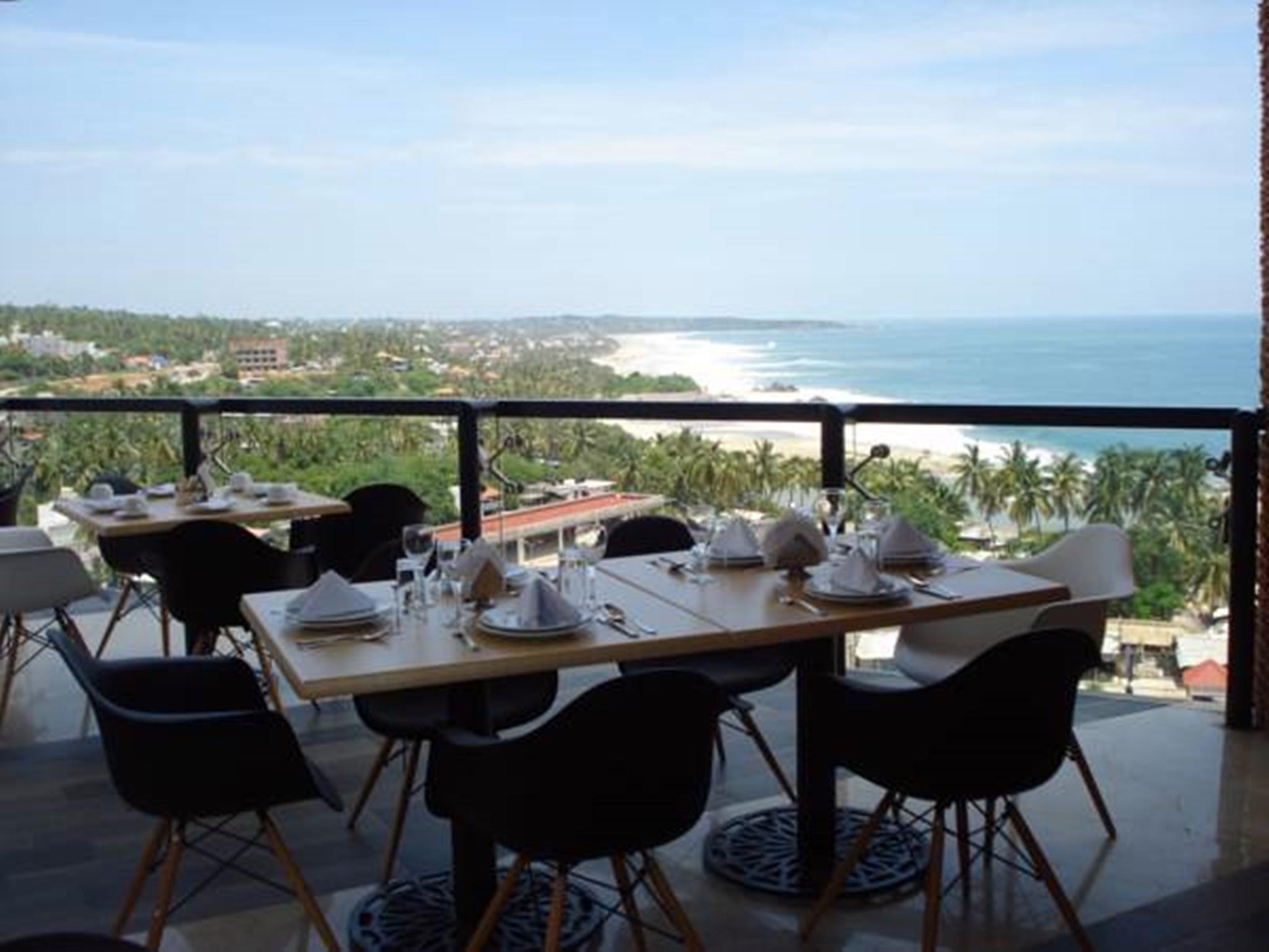 פוארטו אסקונדידו Hotel Caracol Plaza מסעדה תמונה