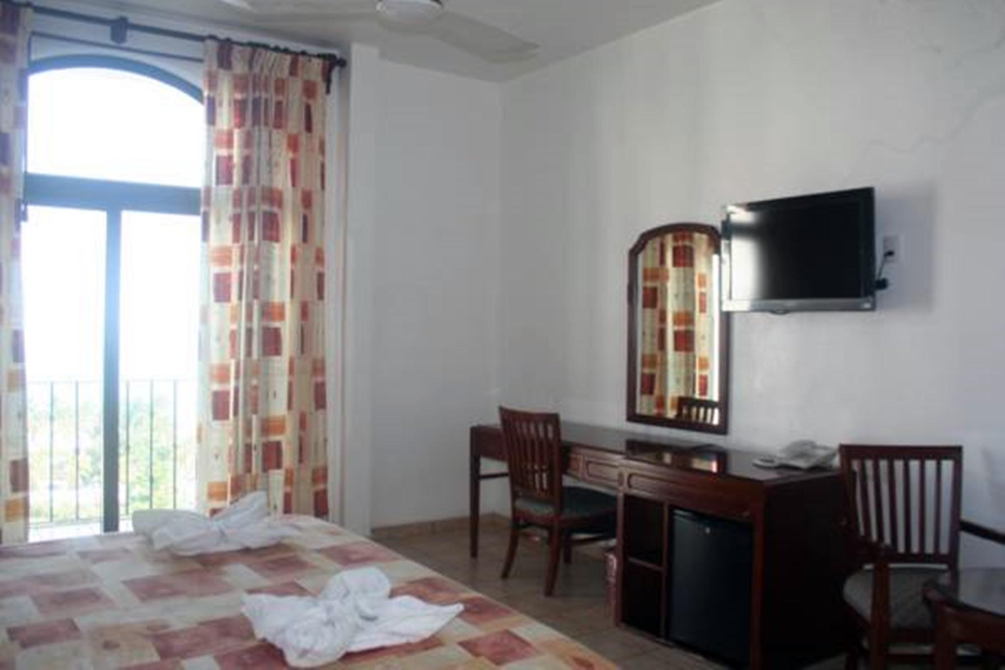 פוארטו אסקונדידו Hotel Caracol Plaza מראה חיצוני תמונה